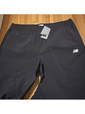 New Balance Black Performance Track Pants with White Logo